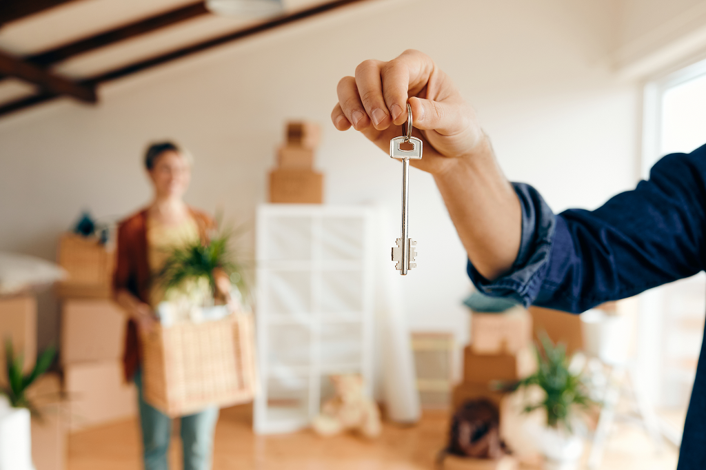 closeup-of-man-holding-key-of-his-new-home.png